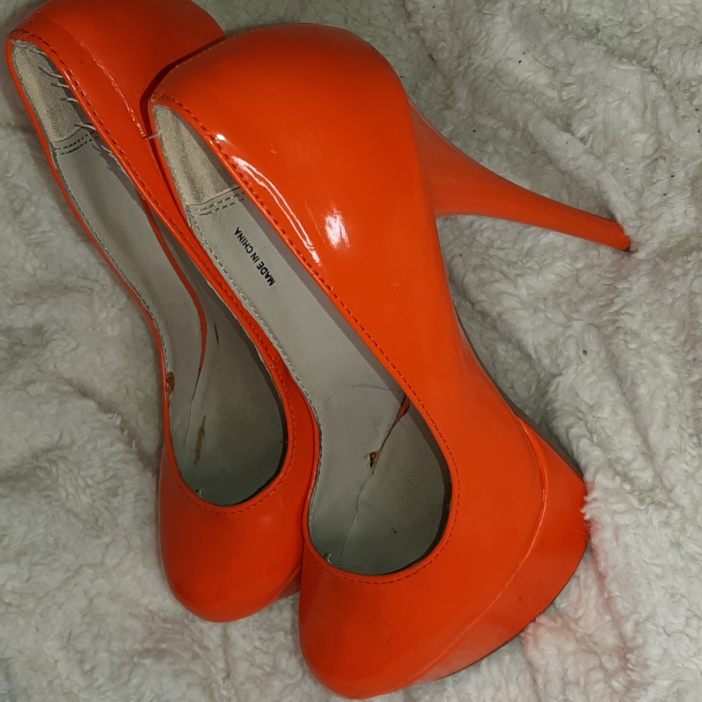 Orange bebe platform heels